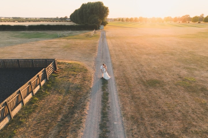 Golden hour from a different perspective ✨ Just the two of them, walking into married life together, surrounded by nothing but open space and that incredible evening light. 🤍 Sometimes you need to get