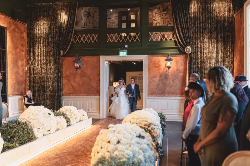 Bride walking down the aisle in Yorkshire wedding venue near Leeds