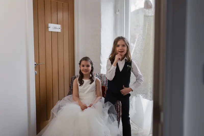 Natural flower girl and page boy portrait during wedding morning preparations in Yorkshire