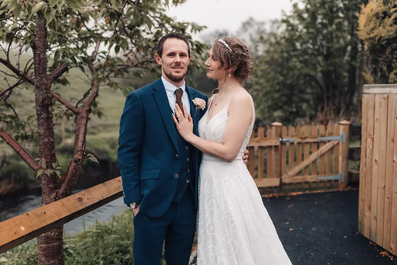 Romantic countryside wedding portrait of bride and groom in Yorkshire landscape