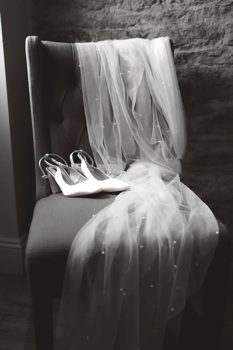 Bridal veil and wedding shoes detail at Yorkshire wedding