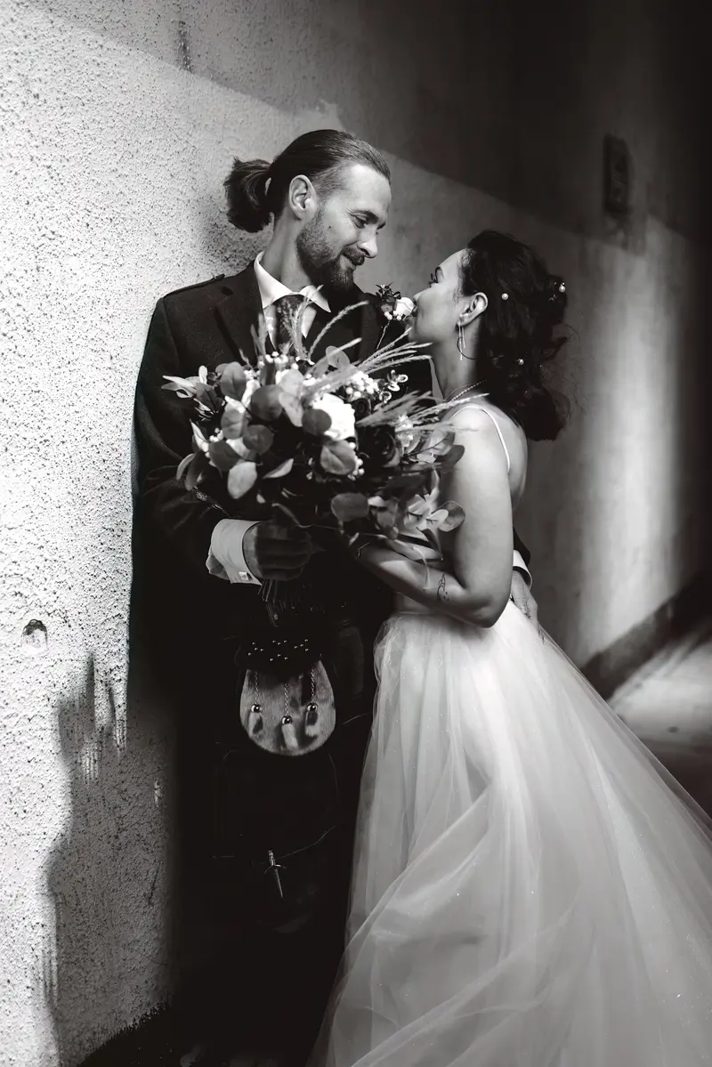 Black and white documentary wedding photography in Yorkshire with emotional bride and groom portrait
