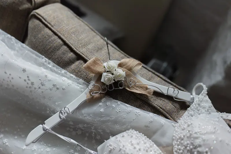 Creative bridal hanger detail photo with personalised wedding dress hanger in Yorkshire