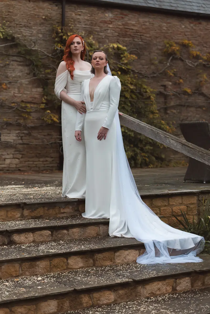 Moody lesbian wedding portrait at luxury Yorkshire wedding venue