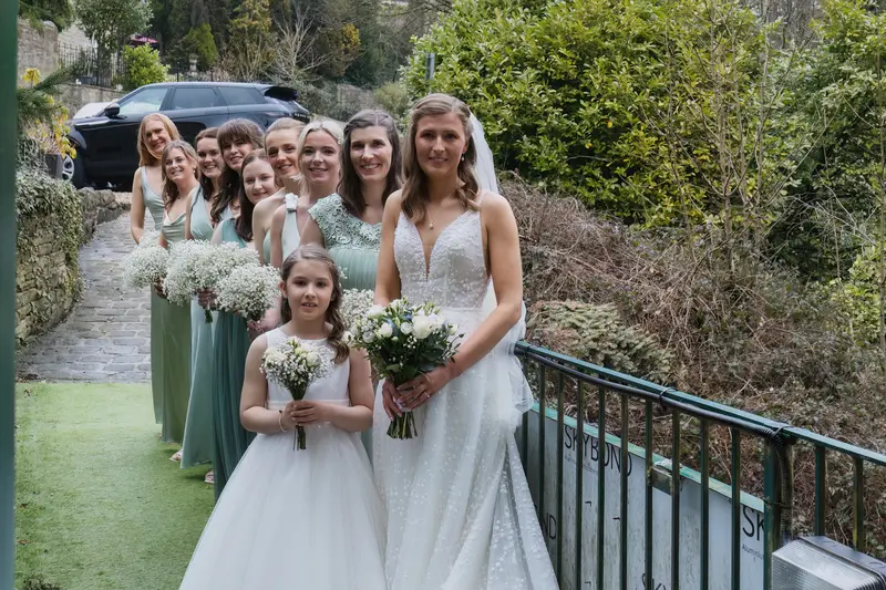 Elegant bridal party portrait outdoors at Yorkshire documentary wedding venue