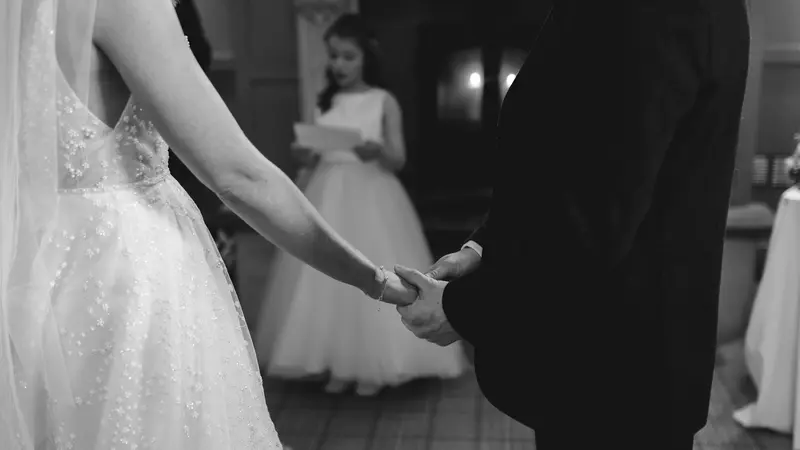 Artistic black and white wedding vows detail photo during emotional ceremony