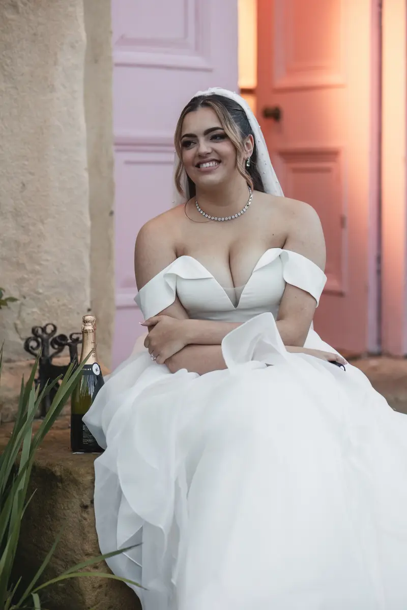Relaxed bridal portrait outside Leeds wedding venue in West Yorkshire