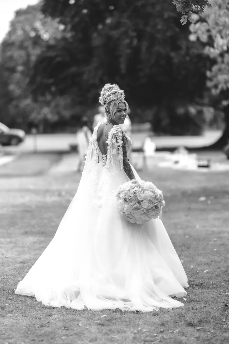 Black and white bridal portrait outdoors, elegant bride portrait photography, cinematic wedding style