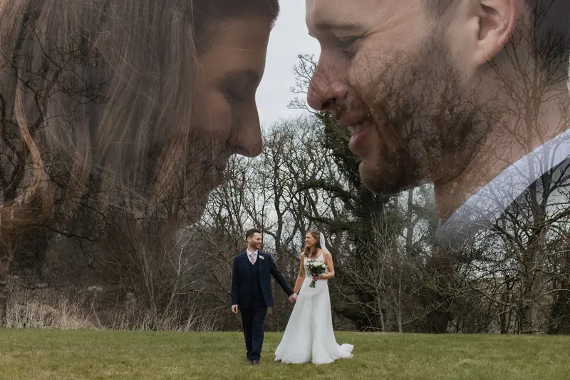 Creative double exposure wedding portrait of bride and groom walking through Yorkshire countryside venue