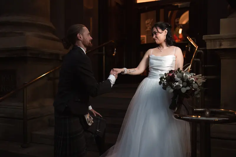 Documentary wedding photographer Yorkshire capturing romantic couple portrait outside historic wedding venue