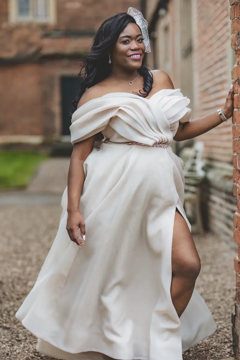 Bride walking outside the wedding venue during natural bridal portraits