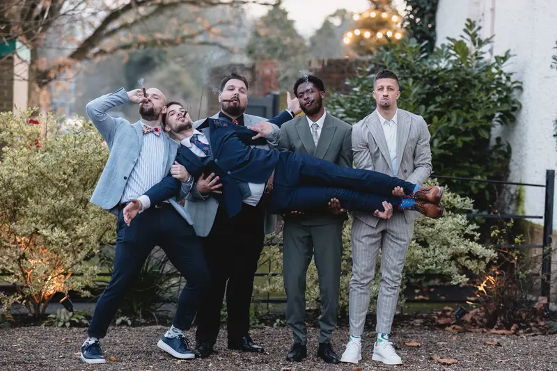 Fun documentary groomsmen moments captured in Leeds wedding photography