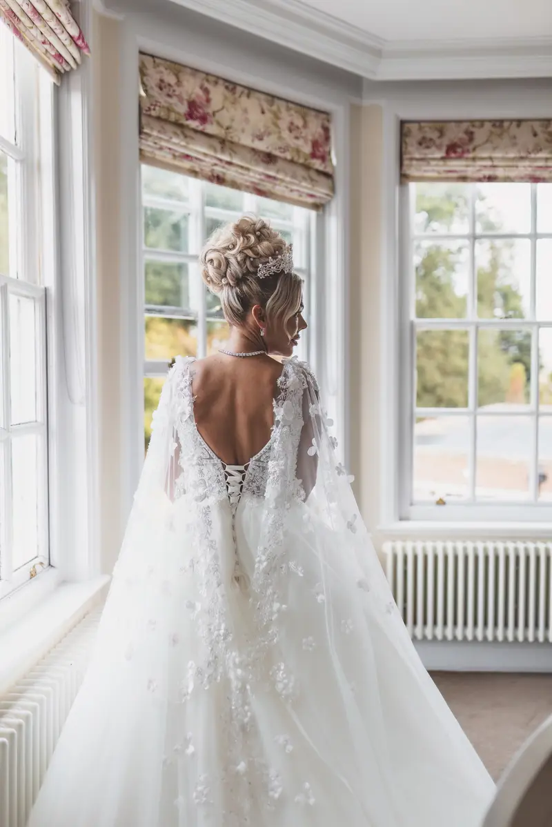 Elegant bridal portrait by window light, luxury wedding dress photography, Yorkshire wedding photographer
