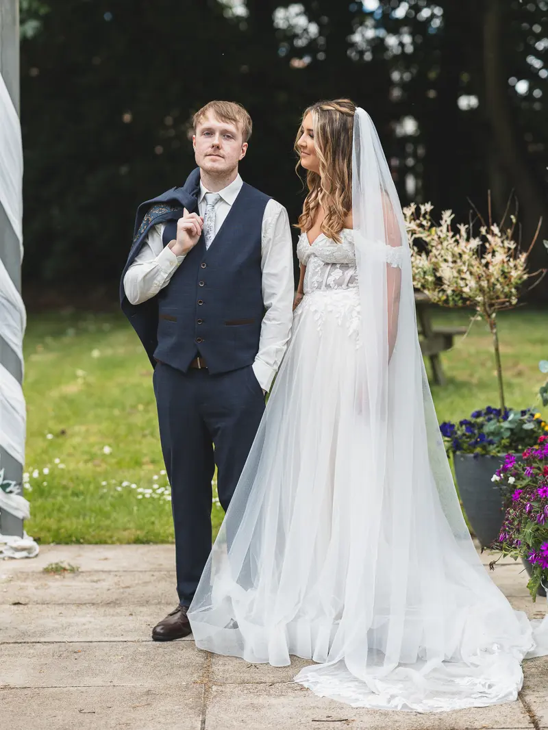 Bride and groom walking together after their wedding ceremony