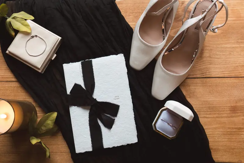 Luxury wedding details flat lay with bridal shoes rings and invitations in Yorkshire