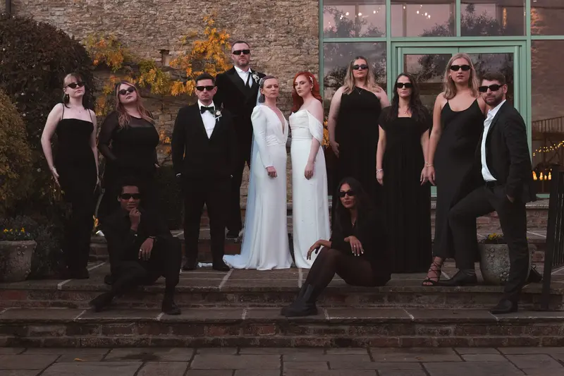 Luxury lesbian wedding party portrait with editorial documentary style in Yorkshire