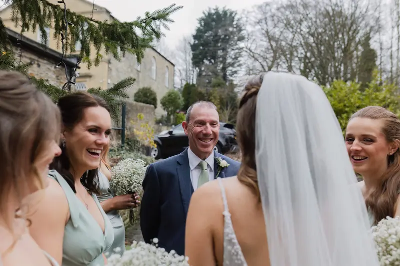Candid father and bridal party moment before ceremony at Yorkshire wedding venue