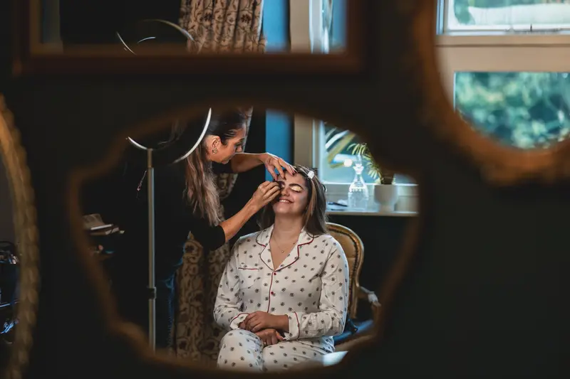 Bridal makeup moments in Leeds with candid wedding photography in West Yorkshire