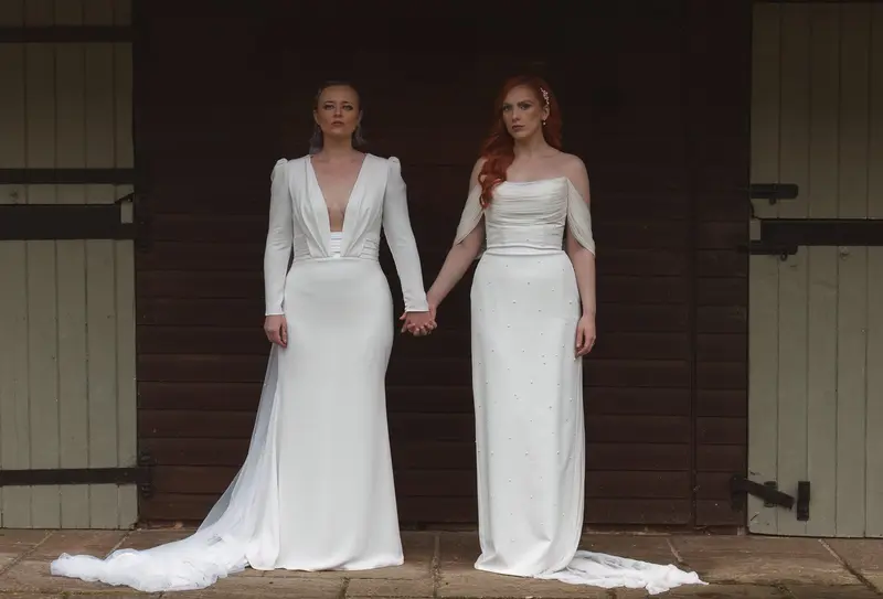 Moody lesbian wedding portrait with modern bridal fashion in Yorkshire