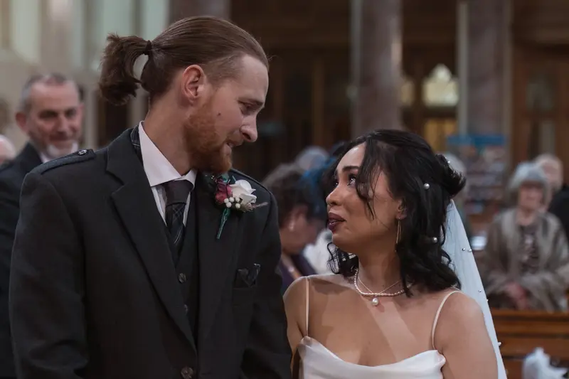 Natural emotional wedding couple portrait during church ceremony in Yorkshire