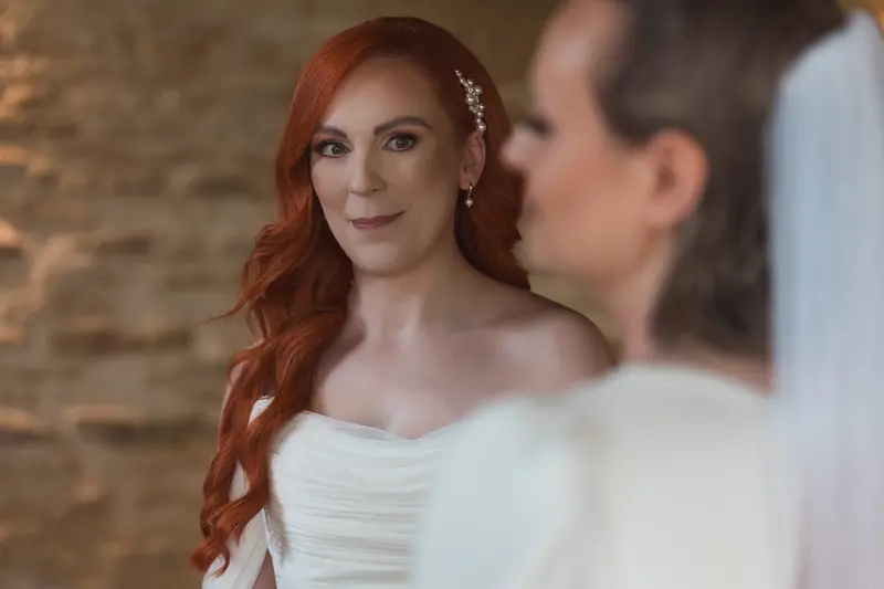 Romantic bridal portrait at rustic Yorkshire wedding venue with natural light