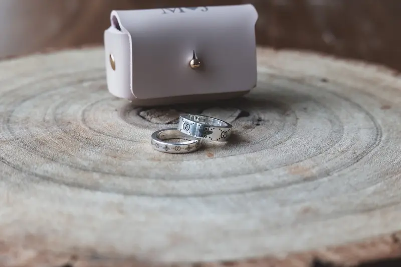 Luxury wedding rings detail shot on rustic wood, Yorkshire wedding photographer, cinematic wedding photography
