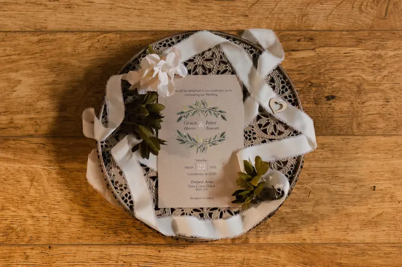 Creative flat lay wedding invitation photo at Tempest Arms Yorkshire wedding