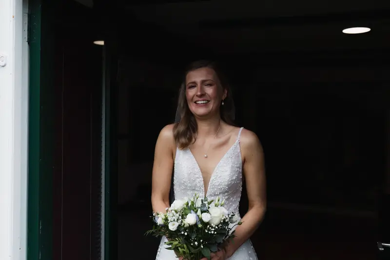 Natural bridal portrait with bouquet during emotional Yorkshire wedding morning