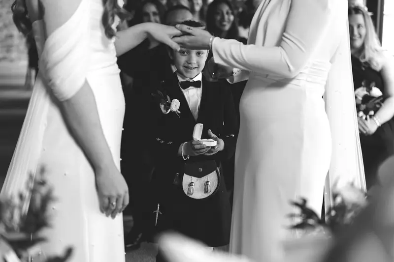 Cute page boy during emotional LGBTQ wedding ceremony in Yorkshire