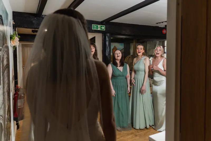 Emotional bridesmaid first look reaction during Yorkshire documentary wedding morning
