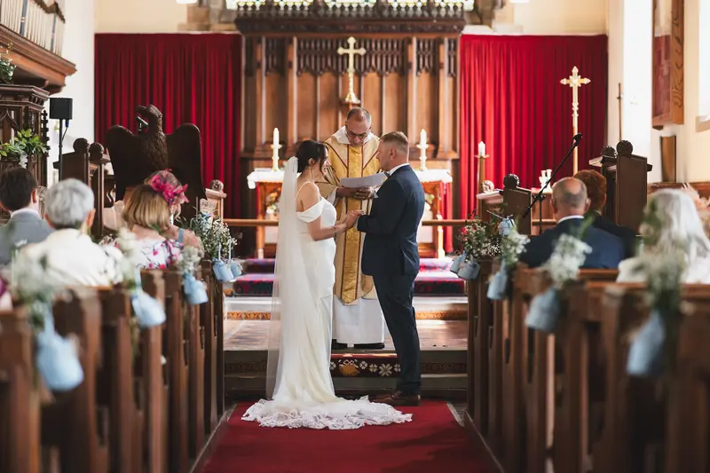 Emotional wedding vows ceremony photo in Yorkshire church