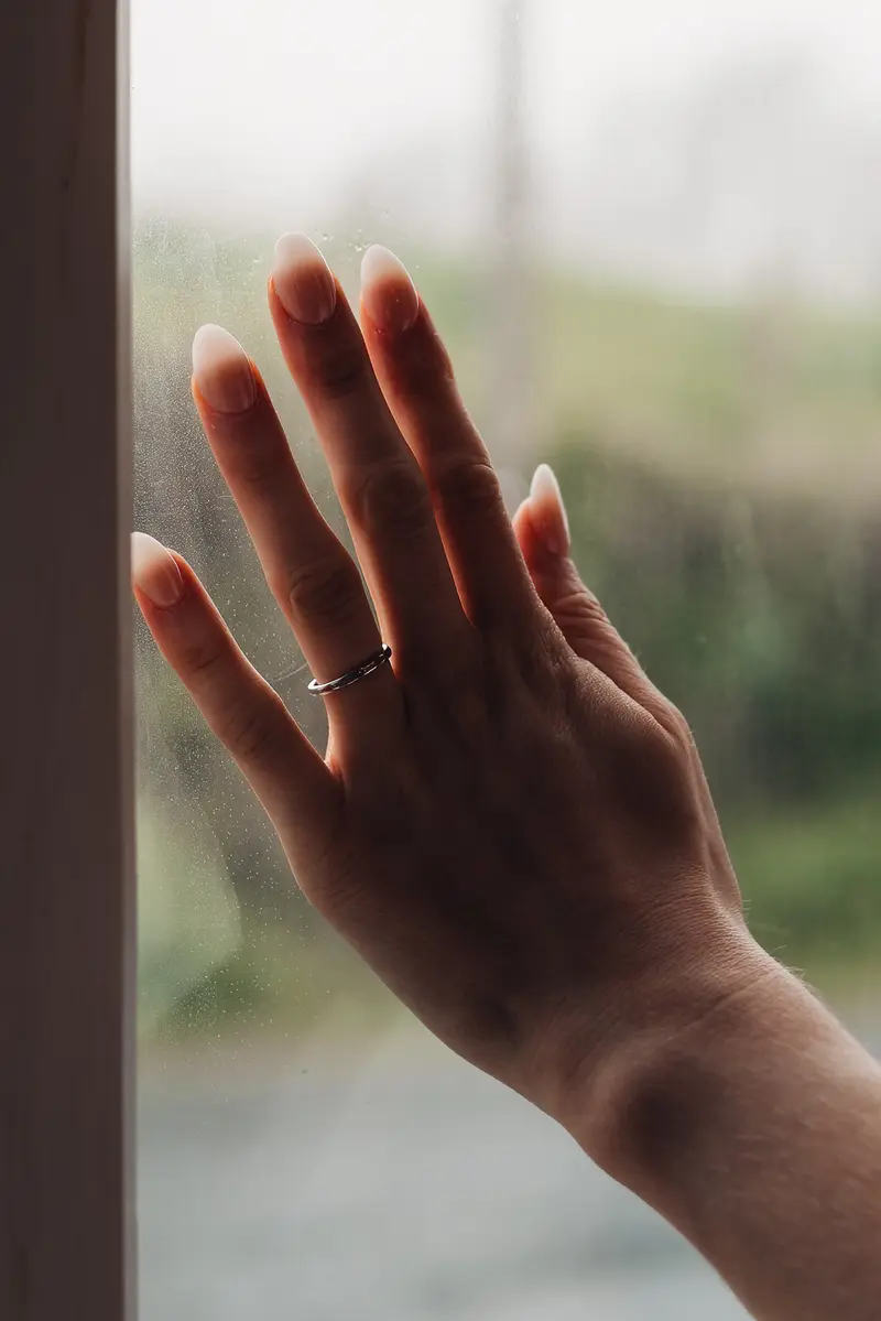 Elegant bridal ring detail photograph with soft natural window light